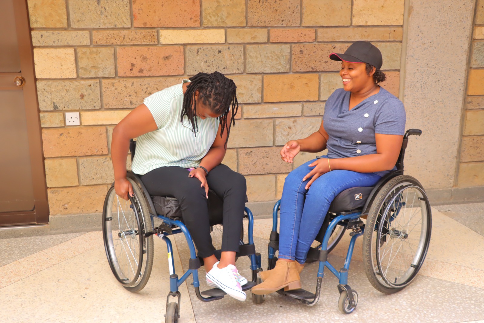 A picture of Catherine engaged in a banter. Catherine showed me what it means to live, to thrive and to enjoy the lemonade.