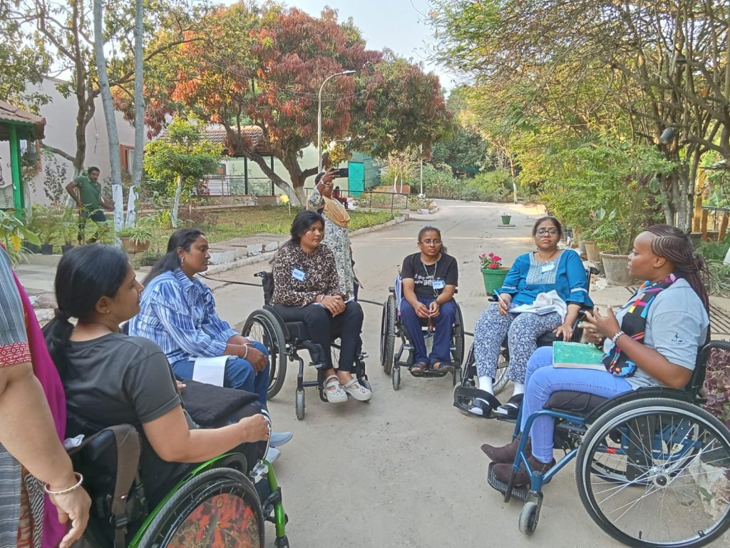 Catherine doing a Peer-to-peer training session in India